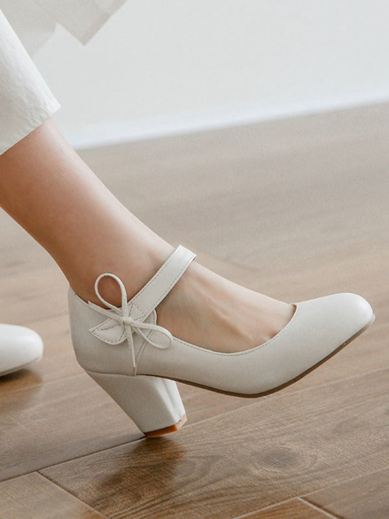 Escarpins rétro à bout rond et nœud papillon à talons épais