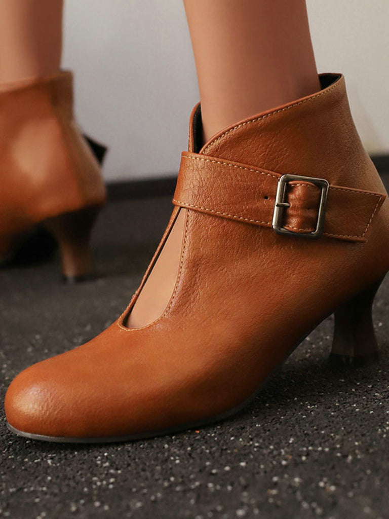 Bottines à bout rond, découpes, boucle et talon bloc