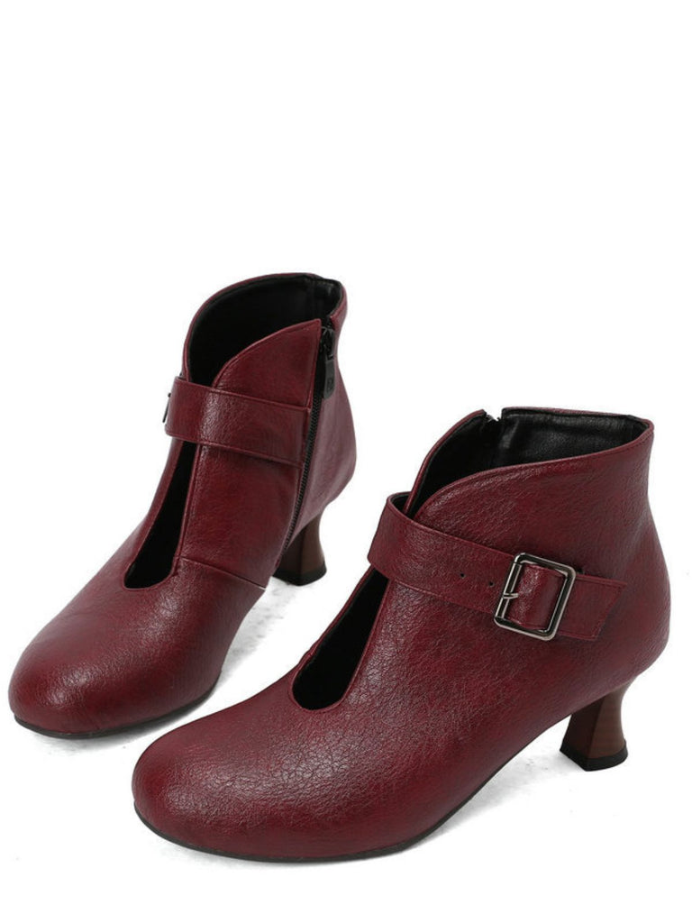 Bottines à bout rond, découpes, boucle et talon bloc