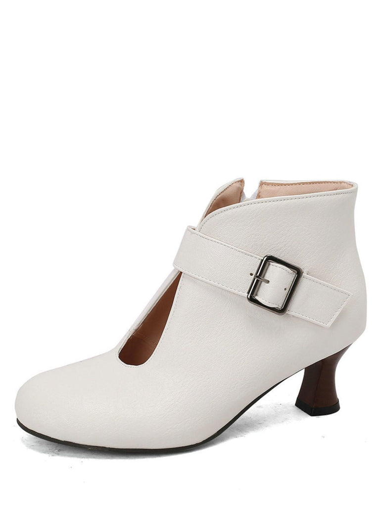 Bottines à bout rond, découpes, boucle et talon bloc
