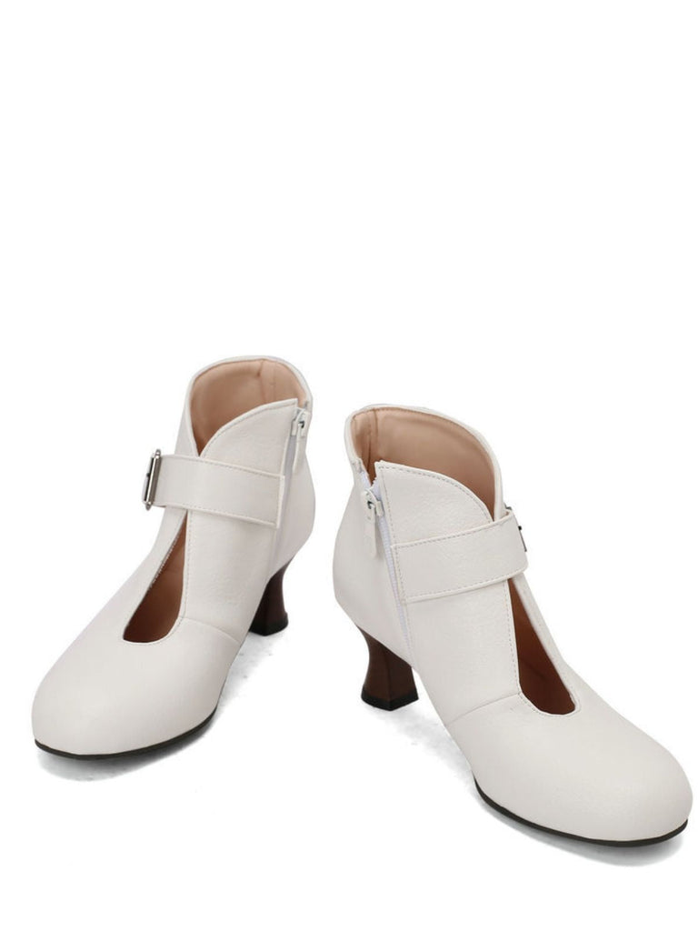 Bottines à bout rond, découpes, boucle et talon bloc