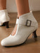 Bottines à bout rond, découpes, boucle et talon bloc