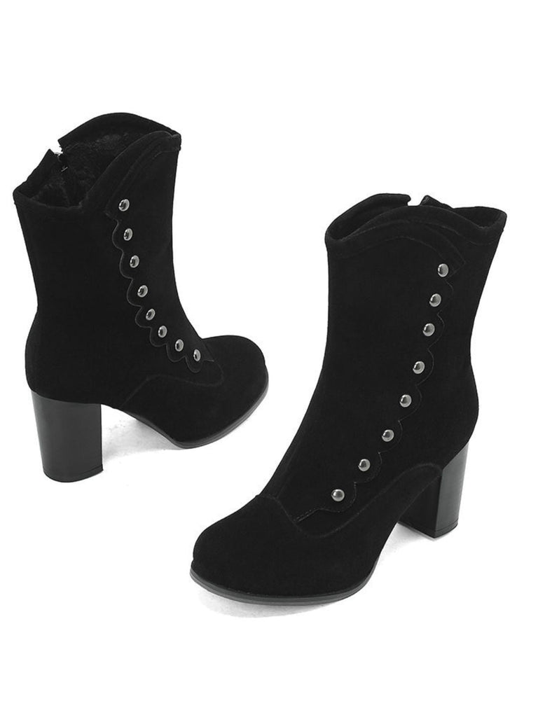 Bottes mi-mollet cloutées en daim doublées de fausse fourrure