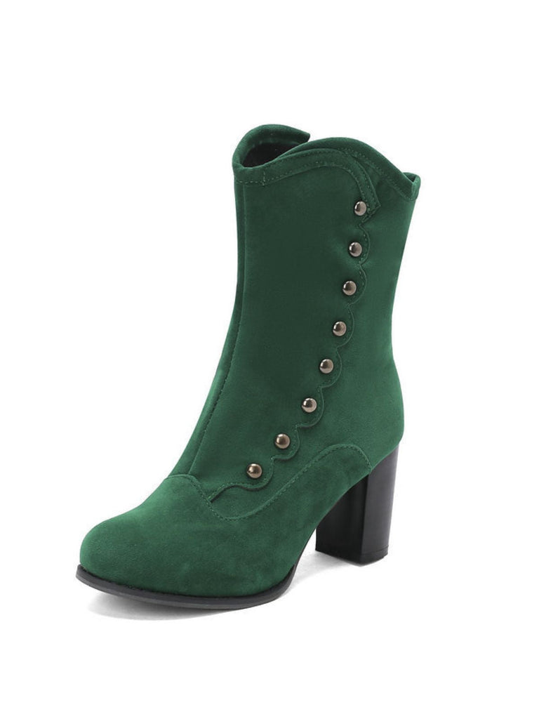 Bottes mi-mollet cloutées en daim doublées de fausse fourrure