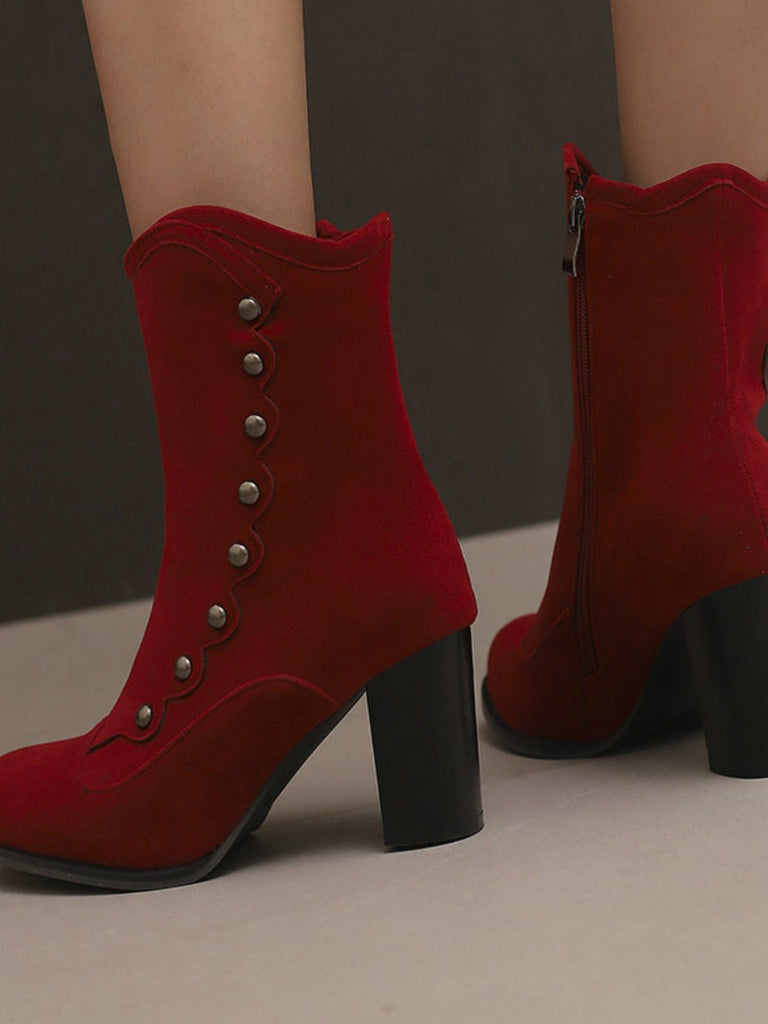 Bottes mi-mollet cloutées en daim doublées de fausse fourrure