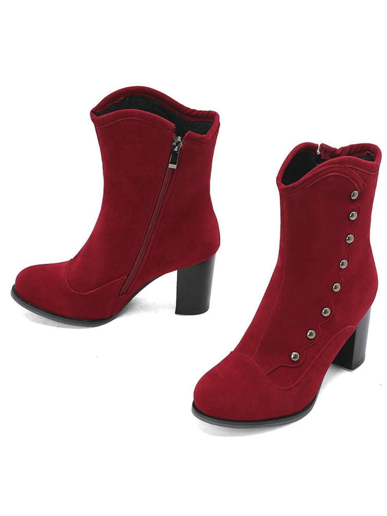 Bottes mi-mollet cloutées en daim doublées de fausse fourrure