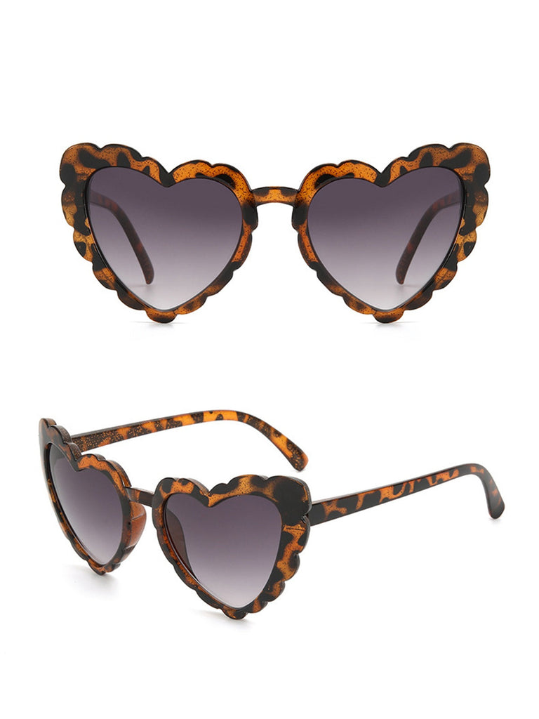 Lunettes de soleil vintage à monture en forme de cœur incurvé