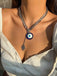 Collier pendentif gothique en forme de paume avec œil de démon