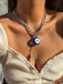 Collier pendentif gothique en forme de paume avec œil de démon