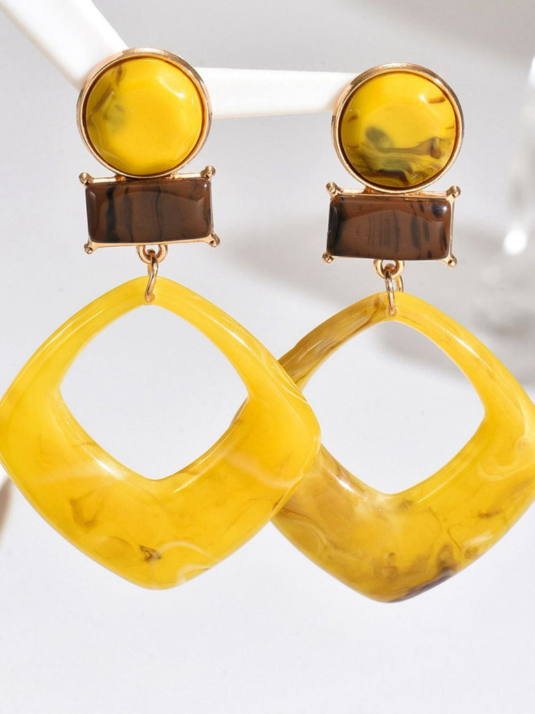 Boucles d'oreilles vintage en résine marbrée à motif géométrique exagéré