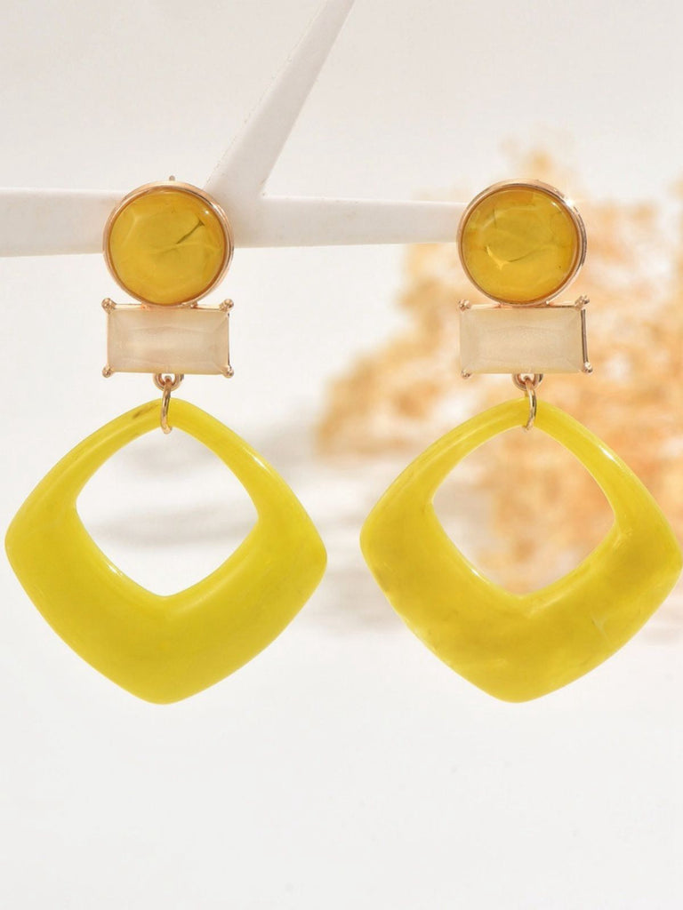 Boucles d'oreilles vintage en résine marbrée à motif géométrique exagéré
