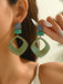 Boucles d'oreilles vintage en résine marbrée à motif géométrique exagéré