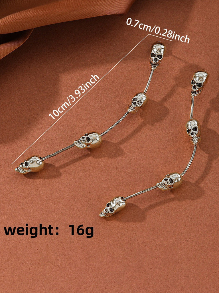 Boucles d'oreilles pendantes argentées à crâne gothique