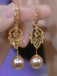 Boucles d'oreilles pendantes dorées à feuilles, strass et perles