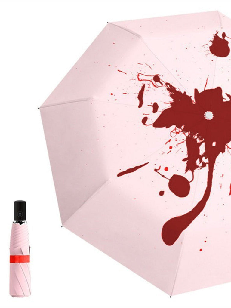 Parapluie automatique rose à éclaboussures de sang révélées par la pluie pour Halloween