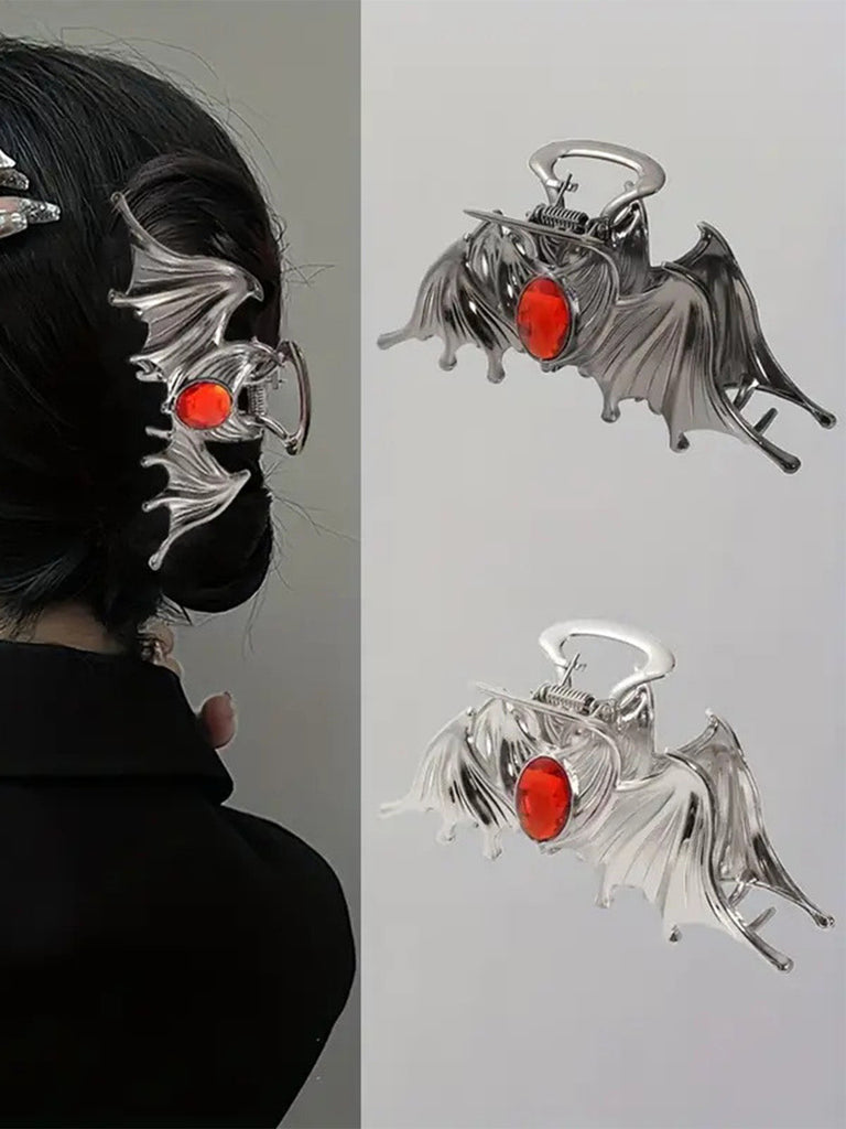 Pince à cheveux métallique gothique ailes de chauve-souris avec gemme rouge