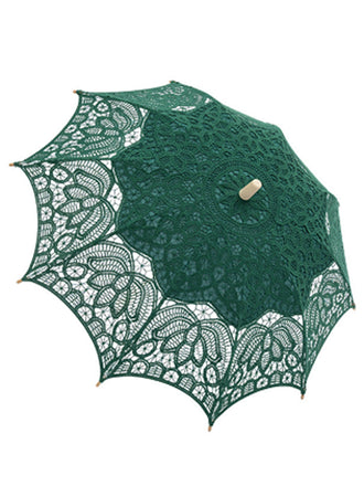 Parapluie vert ajouré en dentelle florale