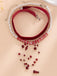 Collier ras-du-cou rouge sang en velours et perles