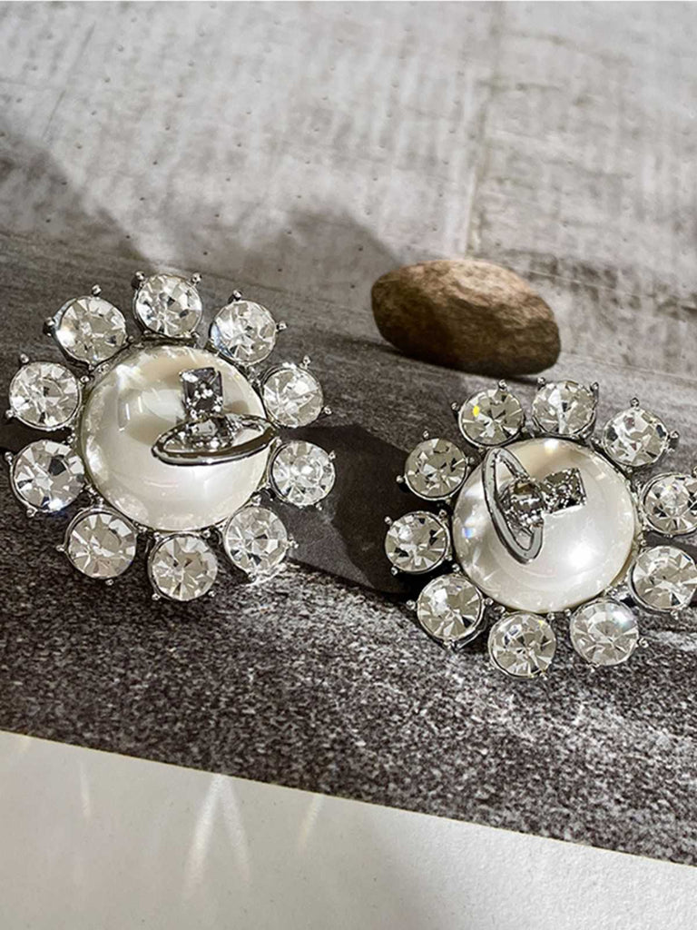 Boucles d'oreilles rétro en argent avec perles et diamants