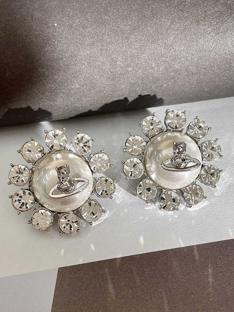 Boucles d'oreilles rétro en argent avec perles et diamants