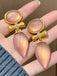 Boucles d'oreilles vintage en forme de goutte d'eau en or rose