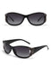 Lunettes de soleil rétro noires à décor de papillon