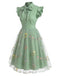 Robe vintage patchwork papillon noire des années 1950 Cocktail Chic