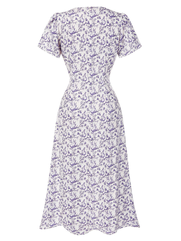 Robe violette col V et boutons motif lapin et fleurs années 40
