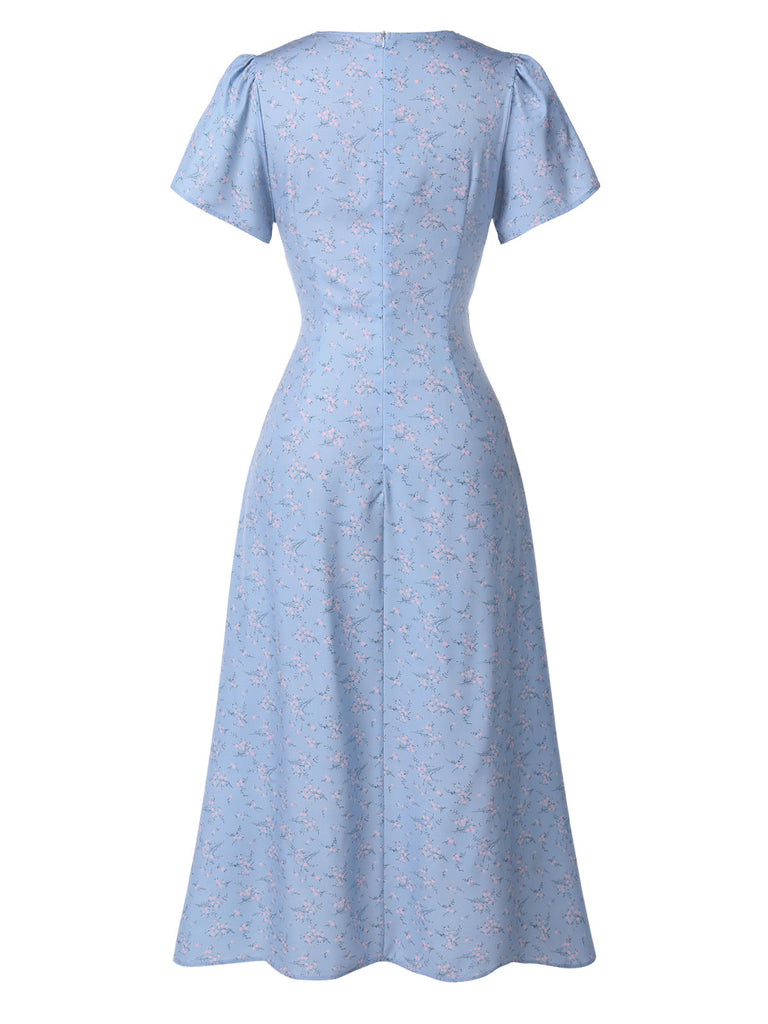 Robe violette col V et boutons motif lapin et fleurs années 40