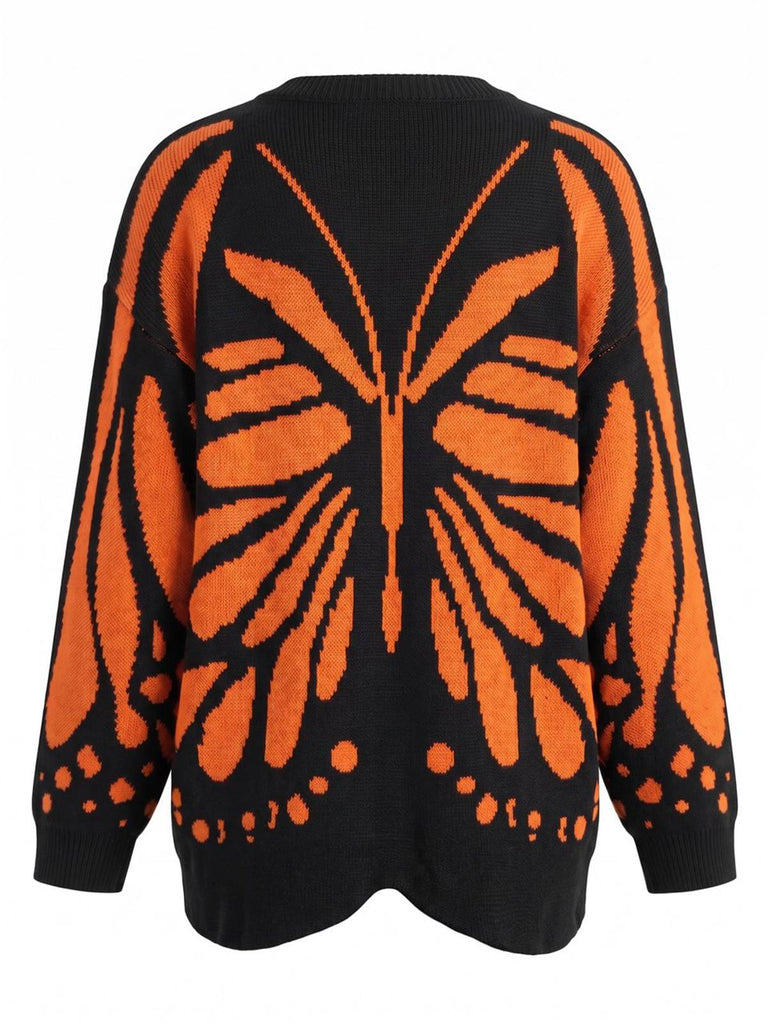 Gilet en maille orange motif papillon monarque années 1950