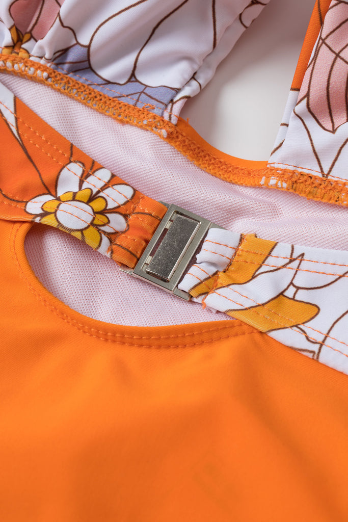 [Prévente] Maillot de bain fleuri orange à bretelles croisées nœud papillon années 1950
