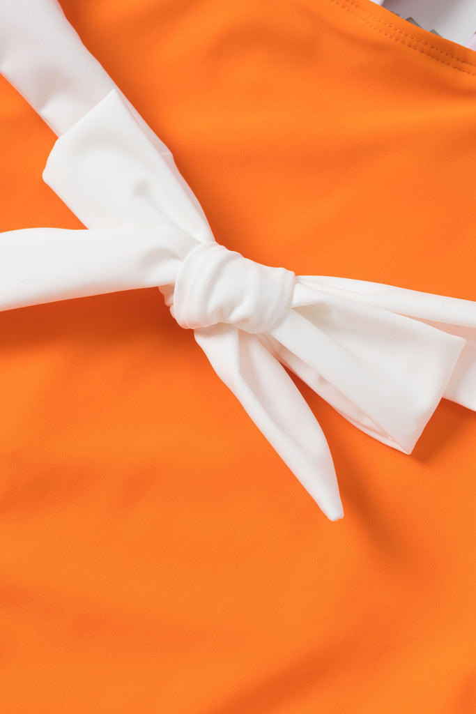 [Prévente] Maillot de bain fleuri orange à bretelles croisées nœud papillon années 1950