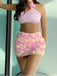 Ensemble bikini dos nu et cache-maillot rose roses 3D années 1960