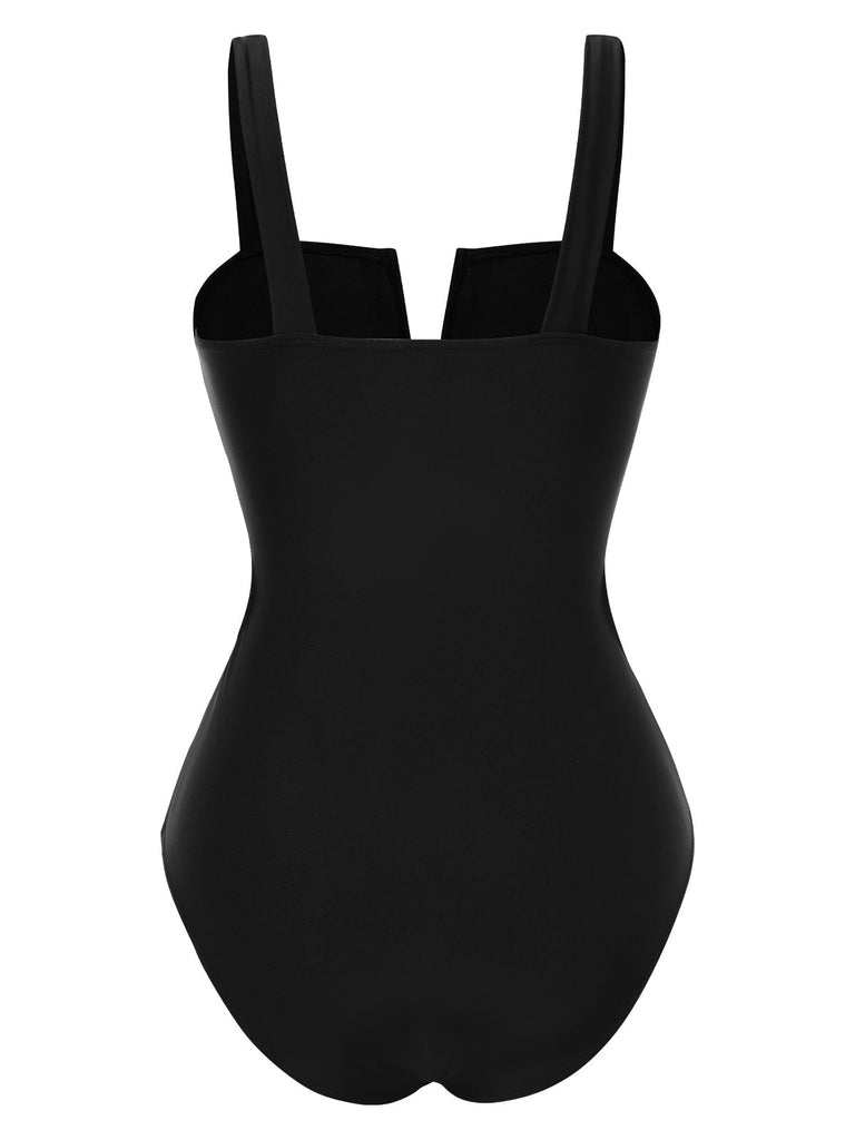 Maillot de bain une pièce noir creux à fleurs blanches des années 1950