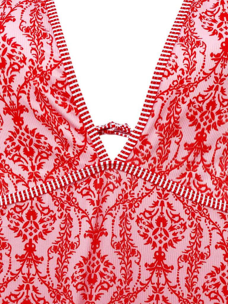 Maillot de bain rouge col V profond dos nu motifs baroques années 1970