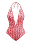 Maillot de bain rouge col V profond dos nu motifs baroques années 1970