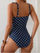 Maillot de bain une pièce bleu foncé à pois à volants et col en V années 1950