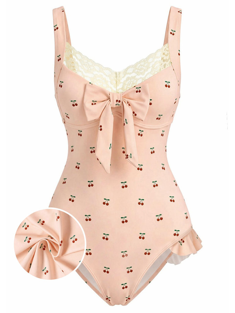 Maillot de bain une pièce rose en dentelle nœud cerise années 1950