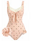 Maillot de bain une pièce rose en dentelle nœud cerise années 1950
