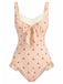 Maillot de bain une pièce rose en dentelle nœud cerise années 1950