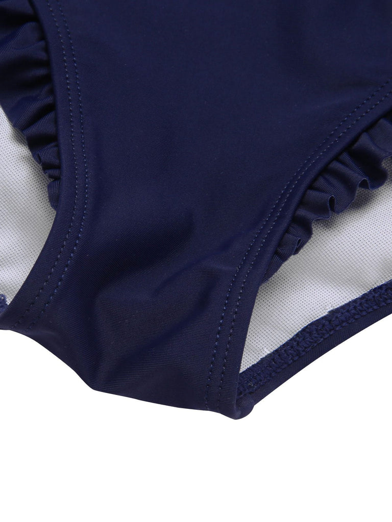 Maillot de bain bleu foncé nautique et nœud des années 1970