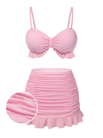 Maillot de Bain uni rose à bretelles et volants des années 1950