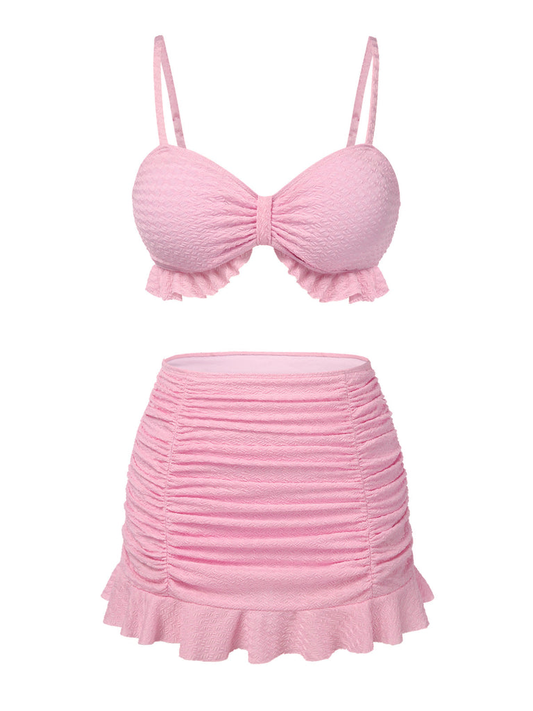 Maillot de Bain uni rose à bretelles et volants des années 1950