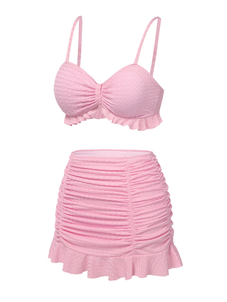 Maillot de Bain uni rose à bretelles et volants des années 1950