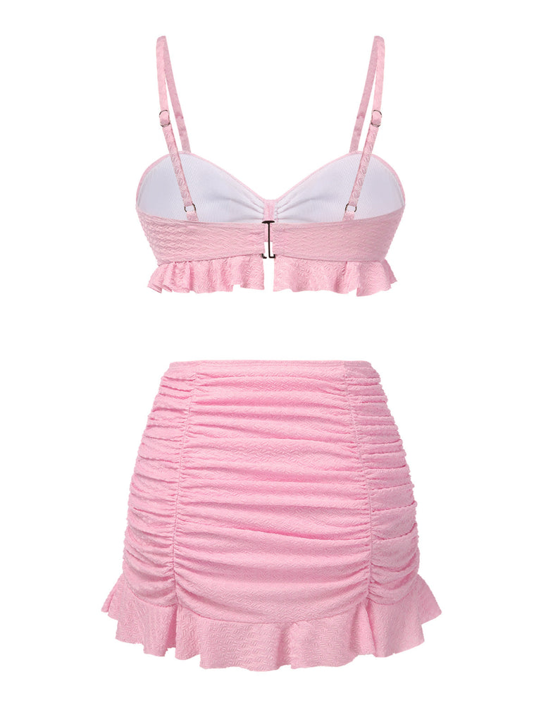 Maillot de Bain uni rose à bretelles et volants des années 1950