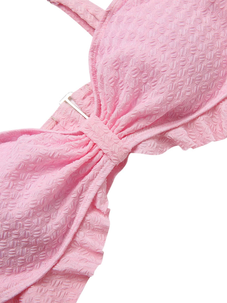 Maillot de Bain uni rose à bretelles et volants des années 1950