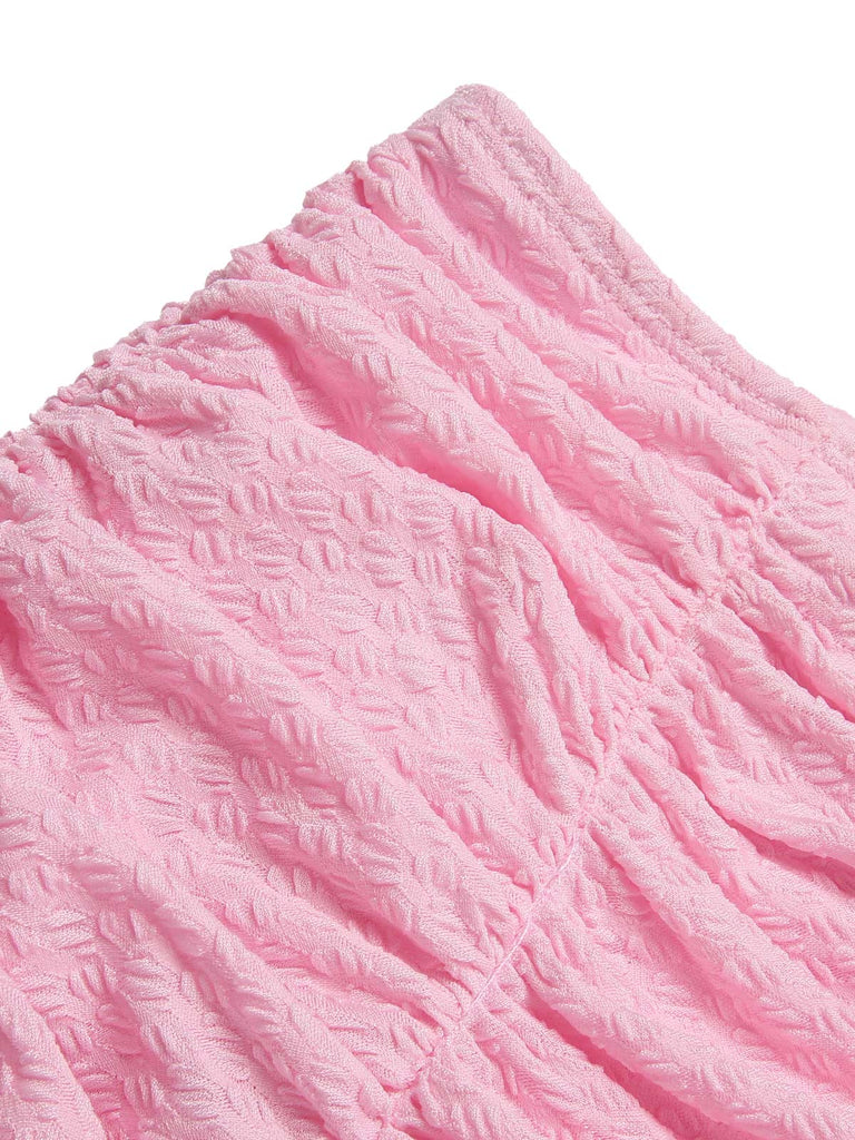 Maillot de Bain uni rose à bretelles et volants des années 1950