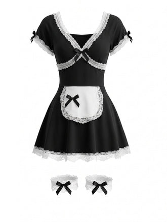 Robe courte noire costume de soubrette en dentelle à nœud et jarretelles années 1980