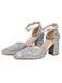 Silver glitter high heels on a white background