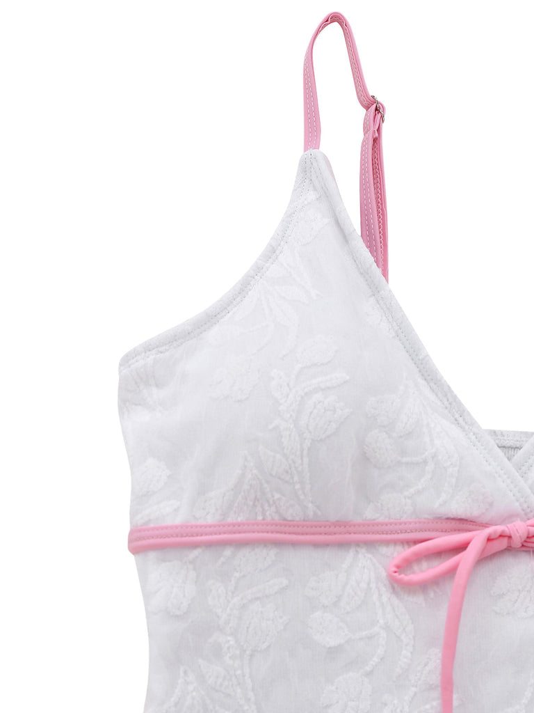 White Swimsuit with pink straps on a white background